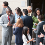 People networking and exchanging business cards